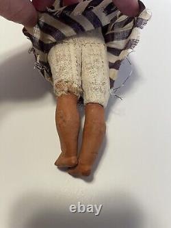 Vintage paper mache doll cabinet size approx. 10 glass eyes