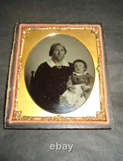Ambrotype de l'ère de la guerre civile d'un esclave afro-américain nourrice noire avec un bébé blanc