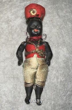 Poupée mignonette articulée en bisque noire ancienne Kestner 4 avec des yeux en verre et en costume ethnique